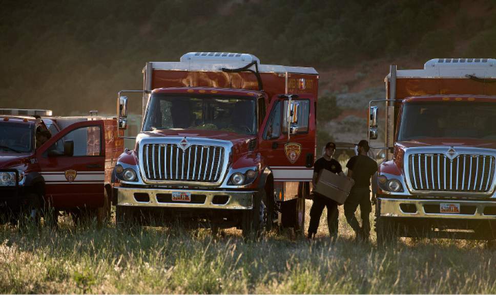 Leah Hogsten  |  The Salt Lake Tribune
Firefighting crews get ready to roll out for the day on the fire line, Monday, June 19, 2017, to put out a wildfire burning north of the southern Utah ski town of Brian Head.