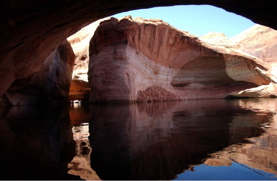 Lisa Marie Miller  |  Tribune file photo


Portions of Cathedral in the Desert and emerging Glen Canyon at Lake Powell have not been seen in nearly 35 years.  It came into view in February 2003 after a drought lowere the reservoir's surface. The waters have risen again submerging the canyon's wonders.