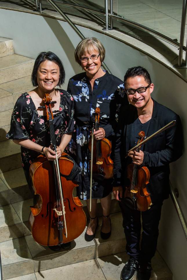 Chris Detrick  |  The Salt Lake Tribune


Intermezzo Chamber Music's Pegsoon Whang, cello, Lynette Stewart, violin, and Lun Jiang, violin, pose for a portrait at Westminster College Jewett Center in Salt Lake City on Tuesday, June 6, 2017.