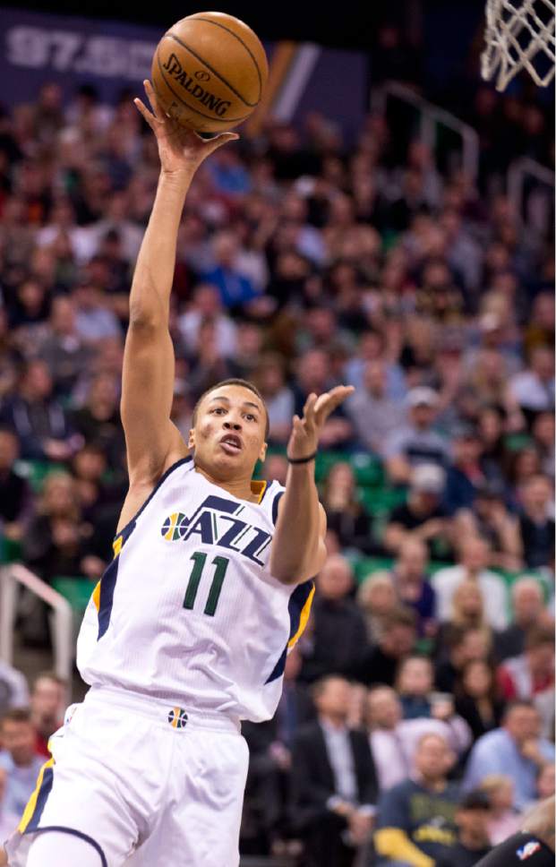Lennie Mahler  |  The Salt Lake Tribune

Dante Exum shoots the ball in the first half of a basketball game between the Utah Jazz and the LA Clippers at Vivint Smart Home Arena, Monday, Feb. 13, 2017.