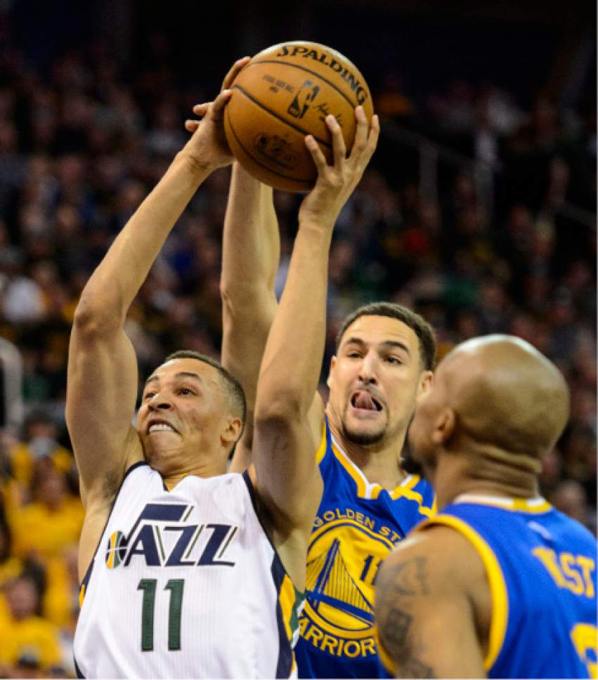 Steve Griffin  |  The Salt Lake Tribune


Utah Jazz guard Dante Exum (11) gets past Golden State Warriors guard Klay Thompson (11) during game 4 of the NBA playoff game between the Utah Jazz and the Golden State Warriors at Vivint Smart Home Arena in Salt Lake City Monday May 8, 2017.