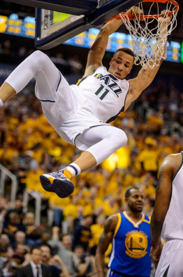 Steve Griffin  |  The Salt Lake Tribune


Utah Jazz guard Dante Exum (11) hangs on the basket after a monster slam dunk during game 4 of the NBA playoff game between the Utah Jazz and the Golden State Warriors at Vivint Smart Home Arena in Salt Lake City Monday May 8, 2017.
