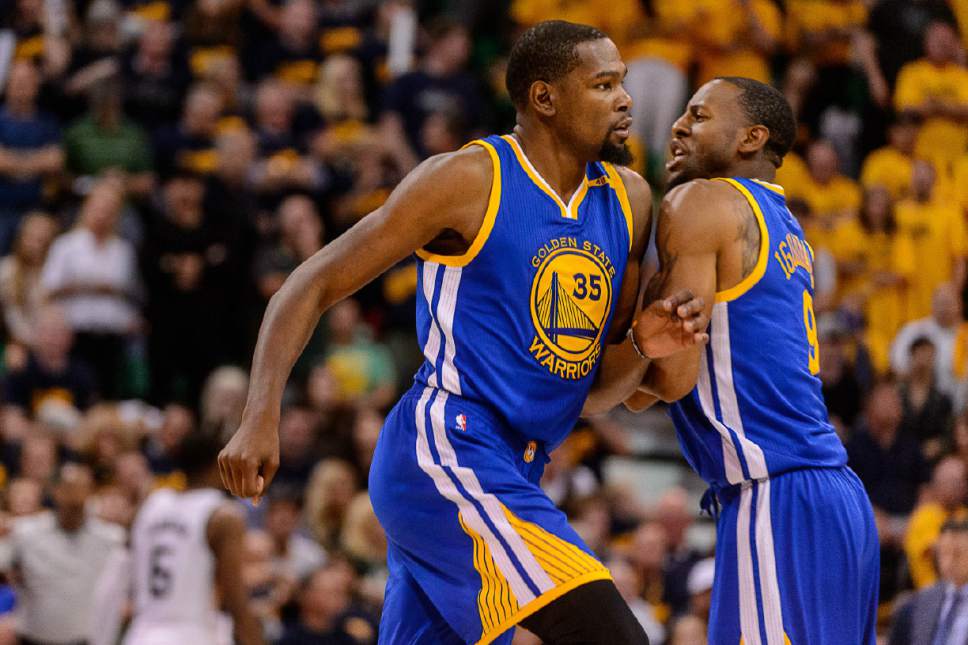 Trent Nelson  |  The Salt Lake Tribune
Golden State Warriors forward Kevin Durant (35) and Golden State Warriors forward Andre Iguodala (9) celebrate one of Durant's scores as the Utah Jazz host the Golden State Warriors in Game 3 of the second round, NBA playoff basketball in Salt Lake City, Saturday May 6, 2017.