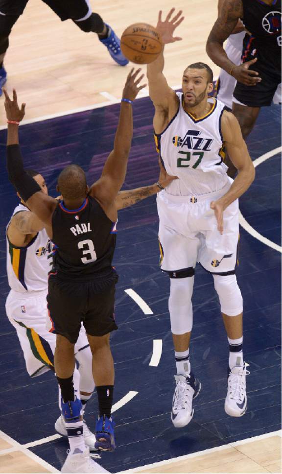 Leah Hogsten  |  The Salt Lake Tribune 
Utah Jazz center Rudy Gobert (27) tries to stop LA Clippers guard Chris Paul (3). The Utah Jazz trail the Los Angeles Clippers 59-62 in the third quarter during Game 6 at Vivint Smart Home Arena, Friday, April 28, 2017 during the NBA's first-round playoff series.