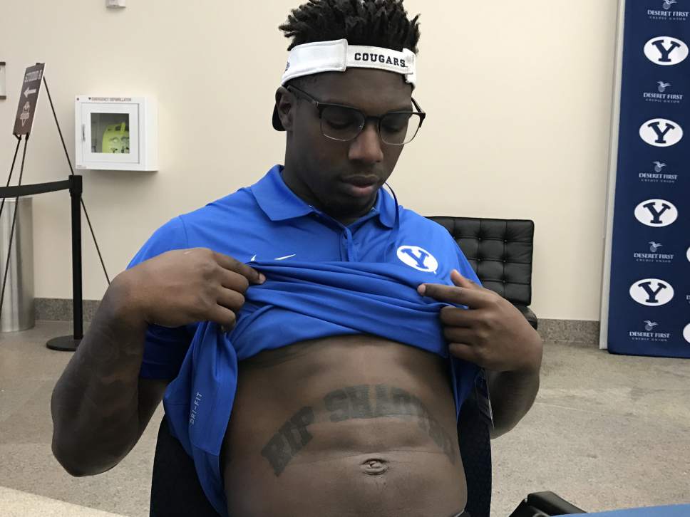 AARON FALK  |  The Salt Lake Tribune

BYU running back Squally Canada shows off his Shadybo tattoo, which honors his cousin, Vinshay J. Bracy, who was shot to death earlier this year. Shadybo was Bracy's rap nickname.