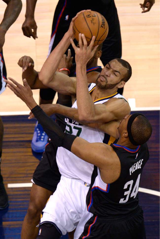 Leah Hogsten  |  The Salt Lake Tribune 
Utah Jazz center Rudy Gobert (27) battles LA Clippers forward Paul Pierce (34) in the paint. The Utah Jazz trail the Los Angeles Clippers 59-62 in the third quarter during Game 6 at Vivint Smart Home Arena, Friday, April 28, 2017 during the NBA's first-round playoff series.