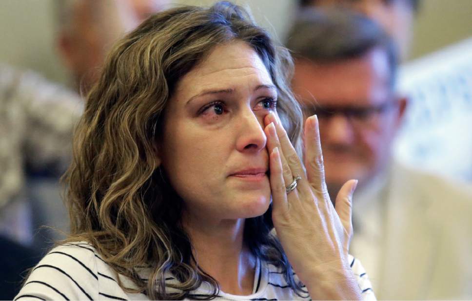 Rick Bowmer  |  AP Photo


Desiree Hennessy cries during the Utah Patients Coalition news conference at the Utah State Capitol Monday, June 26, 2017, in Salt Lake City. A group of activists and Utah residents with chronic conditions has launched a ballot initiative to ask voters next year to pass a broad medical marijuana law. Her adopted son Hestevan has Cerebral Palsy and suffers from chronic nerve pain, seizure disorder, and life threatening complications from his medication.
