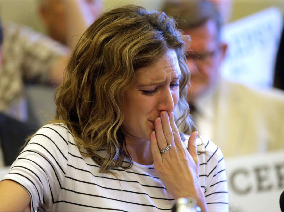 Rick Bowmer  |  AP Photo


Desiree Hennessy cries during the Utah Patients Coalition news conference at the Utah State Capitol Monday, June 26, 2017, in Salt Lake City. A group of activists and Utah residents with chronic conditions has launched a ballot initiative to ask voters next year to pass a broad medical marijuana law. Her adopted son Hestevan has Cerebral Palsy and suffers from chronic nerve pain, seizure disorder, and life threatening complications from his medication.