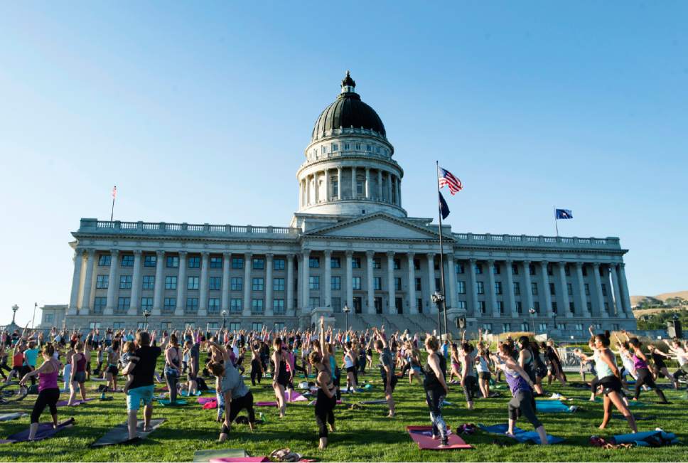 Rick Egan  |  The Salt Lake Tribune

Hundreds participate in Lululemon Yoga on the State Capitol lawn, during the third annual complimentary summer yoga series Elevate Your State of Mind on Wednesday, June 28, 2017.