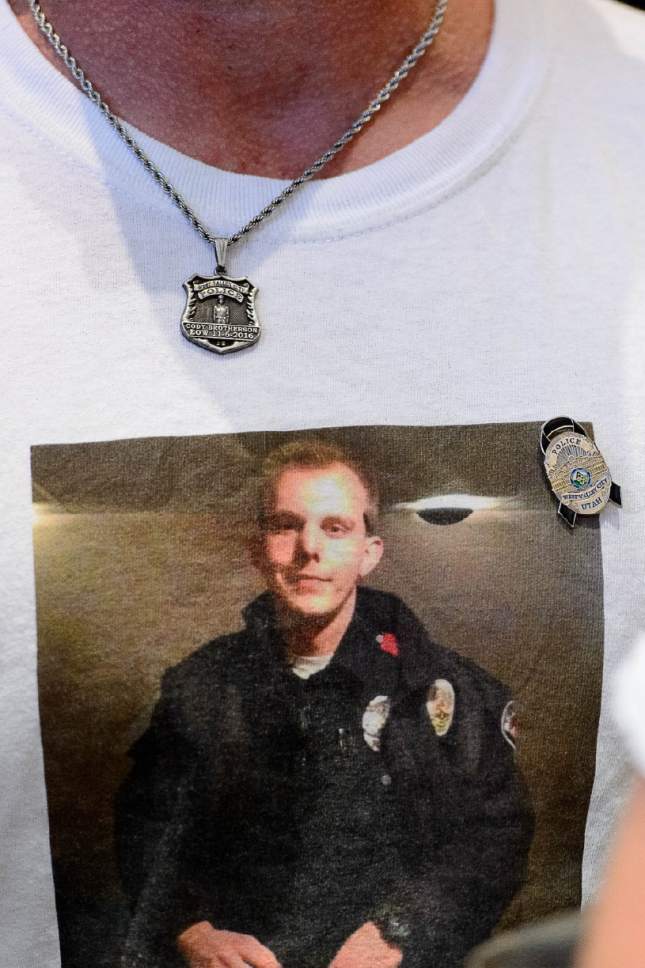 Trent Nelson  |  The Salt Lake Tribune
Fallen West Valley City police officer Cody Brotherson appears on his father Jeff's shirt, Wednesday June 28, 2017.