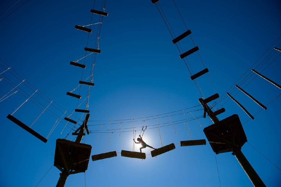 Trent Nelson  |  The Salt Lake Tribune
Olivia Morgan on the ropes course at the National Ability Center in Park City, Tuesday June 20, 2017. With help from the Utah Office of Outdoor Recreation, Governor's Office of Economic Development and Intermountain Healthcare, the National Ability Center has expanded its ropes course.