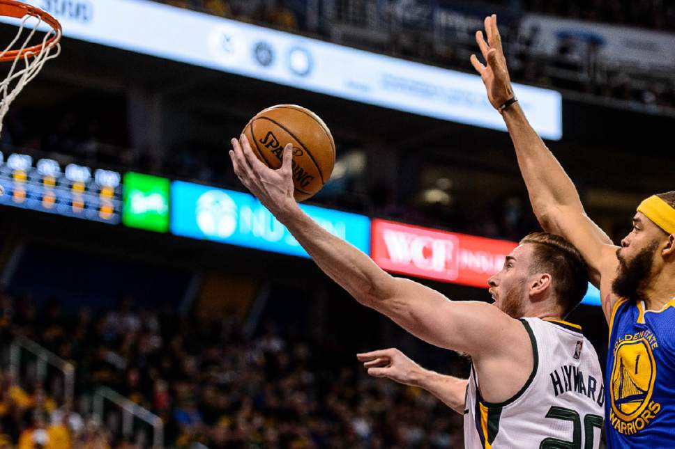 Trent Nelson  |  The Salt Lake Tribune
Utah Jazz forward Gordon Hayward (20) is fouled by Golden State Warriors center JaVale McGee (1) as the Utah Jazz host the Golden State Warriors in Game 3 of the second round, NBA playoff basketball in Salt Lake City, Saturday May 6, 2017.