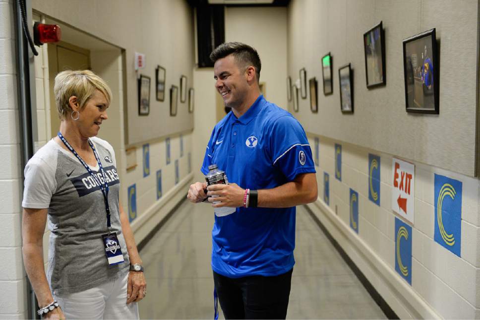 Francisco Kjolseth | The Salt Lake Tribune
BYU quarterback Tanner Mangum is joined by his mother Karen as he gets ready for Football Media Day at the BYU Broadcast Building on Friday, June 23, 2017.  Mangum posted on Instagram in the Spring that he has dealt with depression and has taken medication for it.