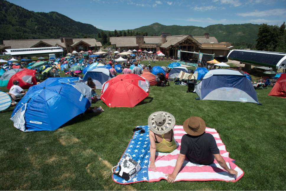 Rick Egan  |  The Salt Lake Tribune

Hundreds gather on the hill at Snowbasin Resort for Blues Brews and BBQ on the lawn at Earl's Lodge with bands Jelly Bread, Too Slim and the Taildraggers, and Folk Hogan, Sunday, July 2, 2017.