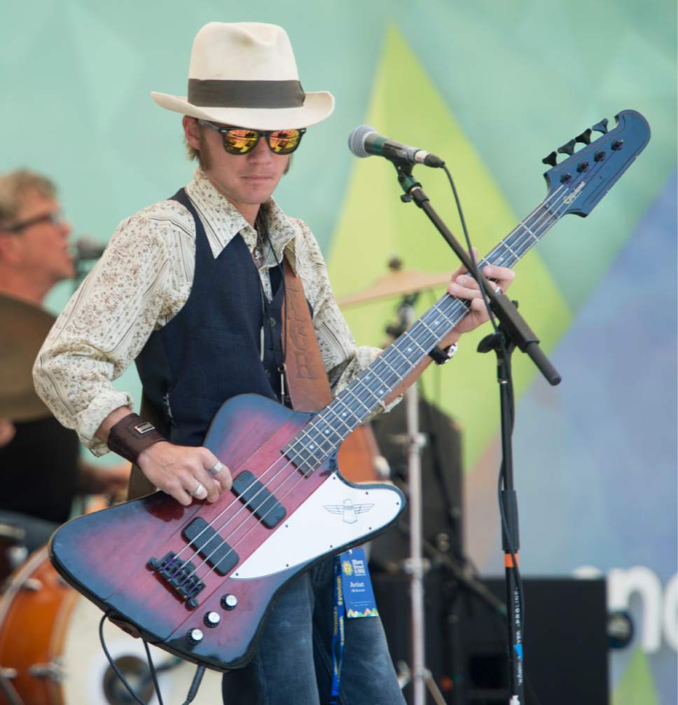 Rick Egan  |  The Salt Lake Tribune

Robert Kearnes plays bass for Too Slim and theTaildraggers, at Snowbasin Resort during the Blues Brews and BBQ on the lawn at Earl's Lodge, Sunday, July 2, 2017.