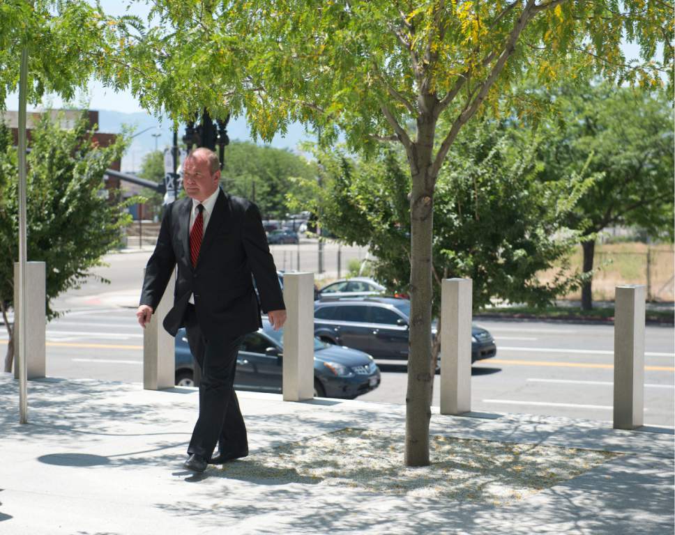 Rachel Molenda  |  The Salt Lake Tribune


Indicted real estate developer and former UTA board chairman Terry Diehl enters the U.S. Courthouse in downtown Salt Lake City for his initial court appearance on Friday, June 30, 2017.