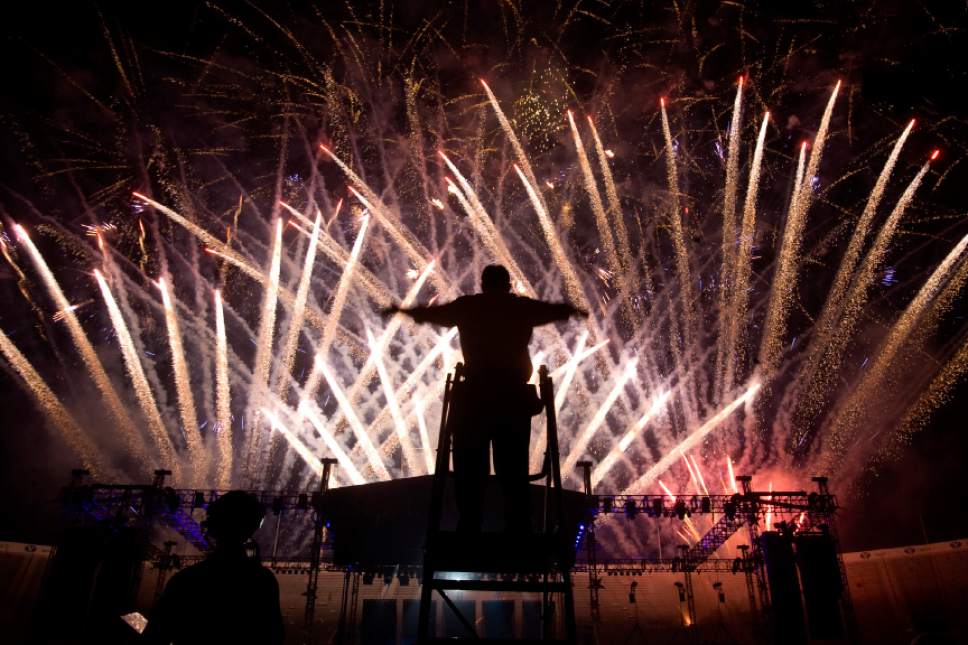 Tribune File Photo

A conductor for the Stadium of Fire Choir directs during the Stadium of Fire fireworks display at the LaVell Edwards Stadium in Provo, Utah on July 4, 2012.