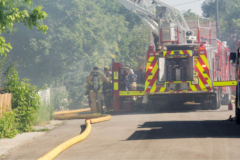 Alex Gallivan  |  Special to the Tribune      


Fire crews respond to a fire burning near 3329 S. 735 E. in Millcreek on Monday, July 3, 2017.