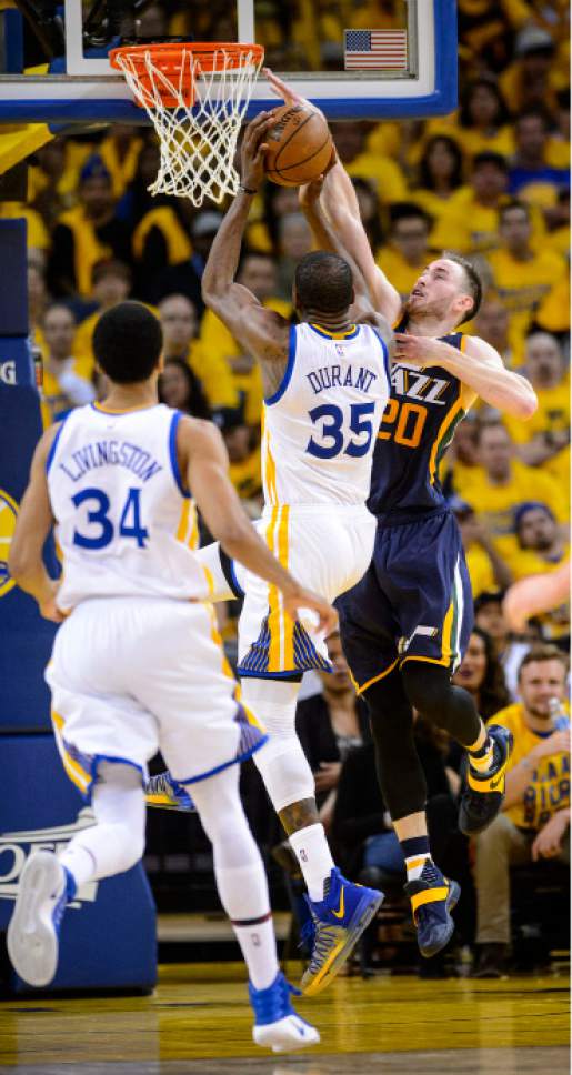 Steve Griffin  |  The Salt Lake Tribune


Utah Jazz forward Gordon Hayward (20) rises up with Golden State Warriors forward Kevin Durant (35) during game 2 of the NBA playoff game between the Utah Jazz and the Golden State Warriors at Oracle Arena in Oakland Thursday May 4, 2017.