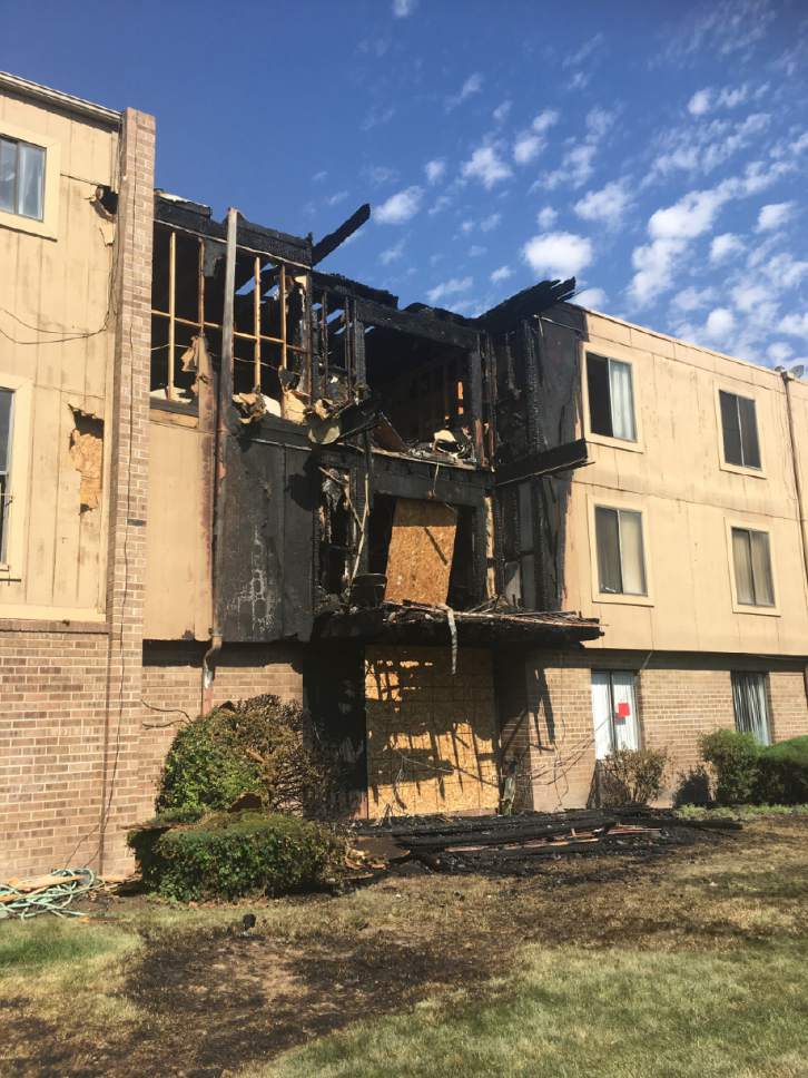 Tiffany Frandsen  |  The Salt Lake Tribune

Residents were evacuated from an apartment complex in Midvale after fireworks ignited a fire around midnight on Tuesday, July 4, 2017.