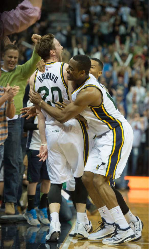 Steve Griffin  |  The Salt Lake Tribune


Utah Jazz guard Alec Burks (10) jumps on Utah Jazz guard Gordon Hayward (20)  after Hayward nailed the game winning shot giving the Jazz a 102-100 victory over the Cleveland Cleveland Cavaliers at EnergySolutions Arena in Salt Lake City, Wednesday, November 5, 2014.