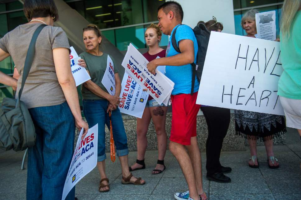 Chris Detrick  |  The Salt Lake Tribune
Advocates for affordable health care wait to speak with staff members of Utah Sen. Mike Lee, R-Utah, outside of the Wallace Bennett Federal Building Wednesday, July 5, 2017.