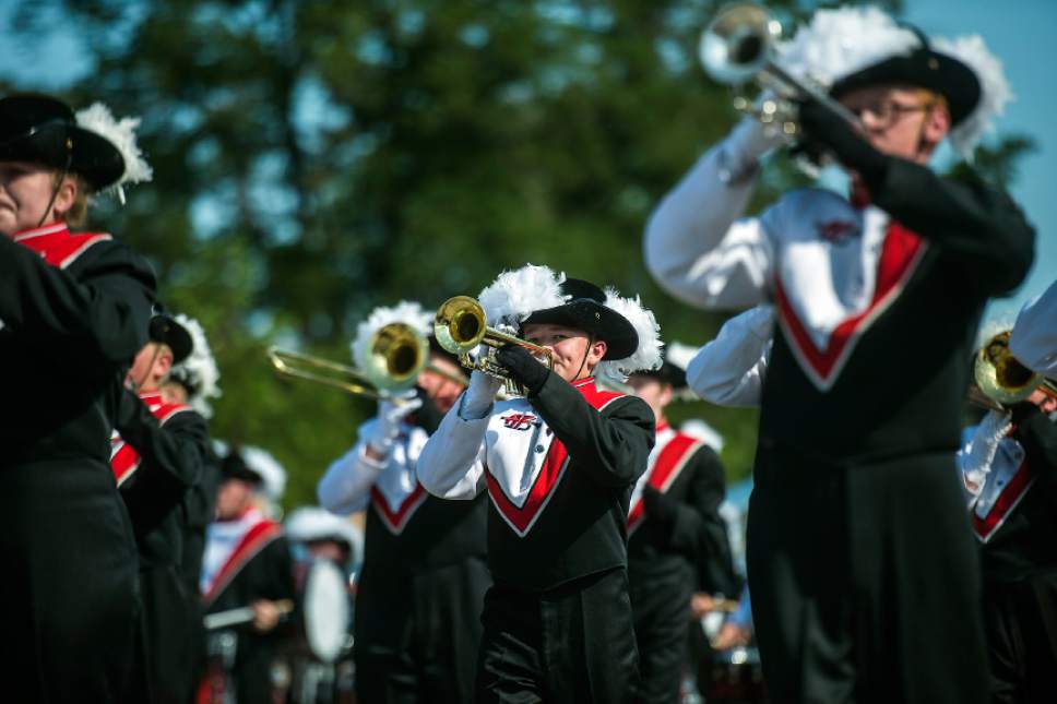 Chris Detrick  |  The Salt Lake Tribune
Members of the American Fork High School marching band perform during the annual Freedom Festival Grand Parade in downtown Provo Tuesday, July 4, 2017.