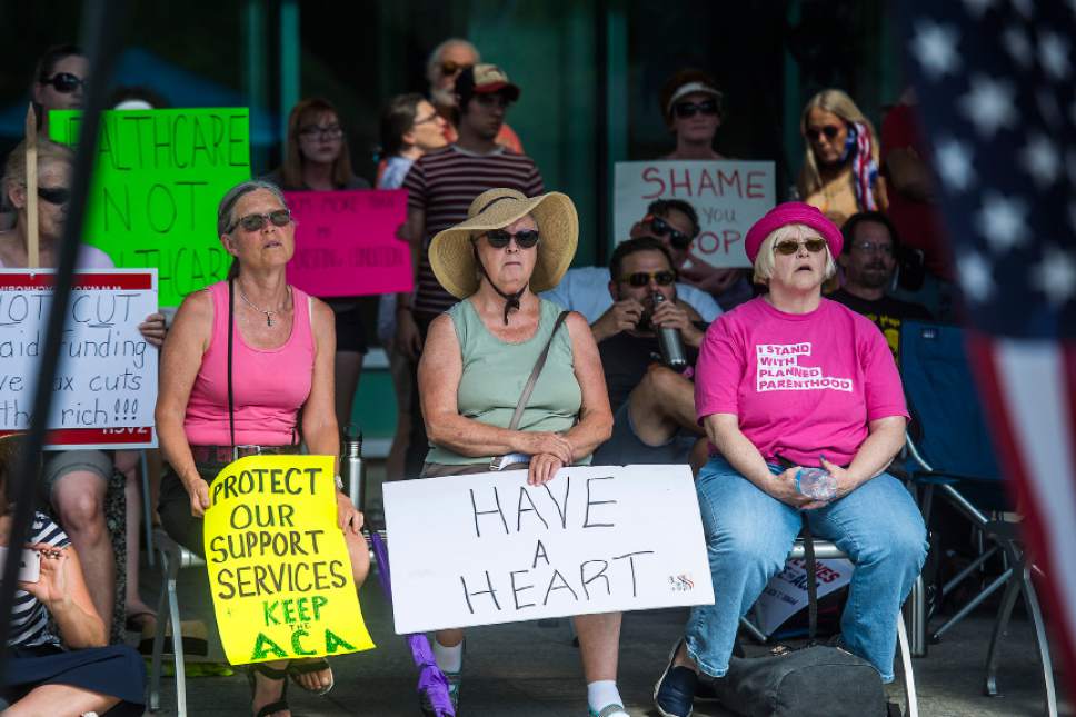 Chris Detrick  |  The Salt Lake Tribune
Advocates for affordable health care rally against the Better Care Reconciliation Act outside of the Wallace Bennett Federal Building Thursday, July 6, 2017.
