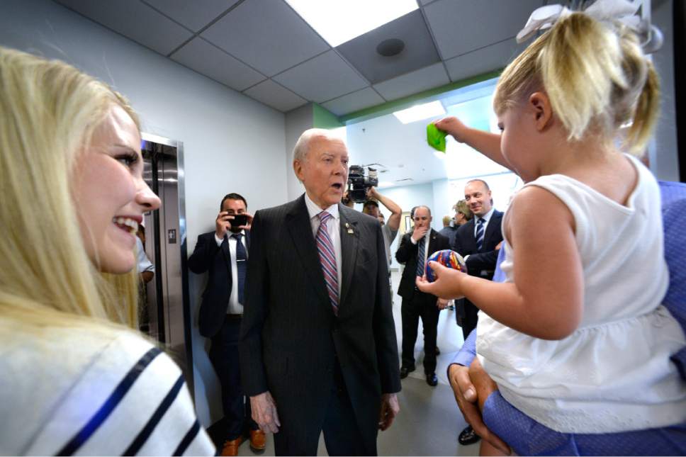 Scott Sommerdorf   |  The Salt Lake Tribune  


Sen. Orrin Hatch is offered a balloon by Elizabeth Smart's daughter, Chloe, prior to the group touring the Utah State Crime Lab in Taylorsville on Thursday, July 6, 2017.