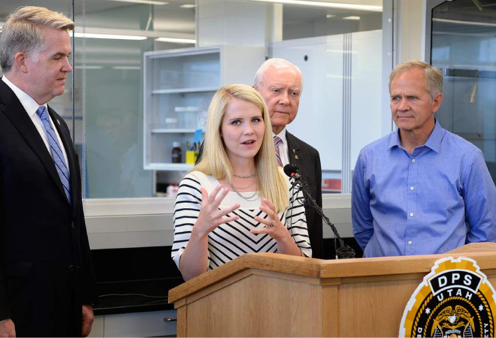 Scott Sommerdorf   |  The Salt Lake Tribune  

Elizabeth Smart answers questions about the importance of the work being done at the Utah State Crime Lab in Taylorsville on Thursday, July 6, 2017, as U.S. Attorney John Huber, left, Sen. Orrin Hatch, center, and Ed Smart, right, listen.