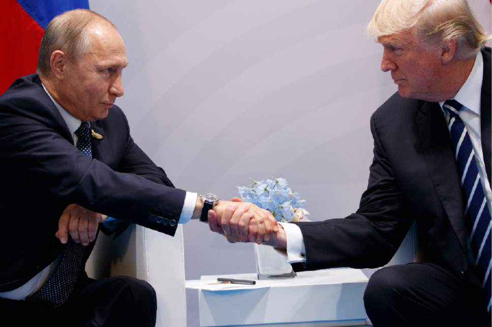 Grins And Handshakes As Trump Encounters Putin For 1st Time - The Salt ...