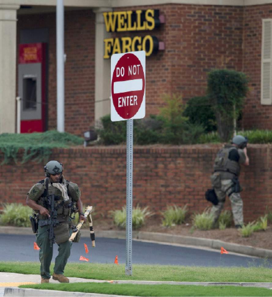 Man claiming to have bomb in bank killed in police standoff The Salt