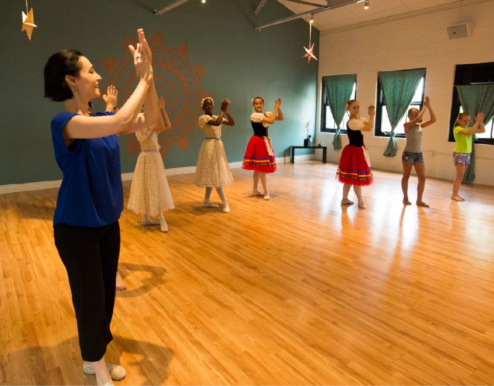Rick Egan  |  The Salt Lake Tribune

Justine Sheedy-Kramer, SLC Ballet, leads a dance workshop at the Millcreek Arts Festival at the Historic Baldwin Radio Factory, Friday, July 7, 2017.