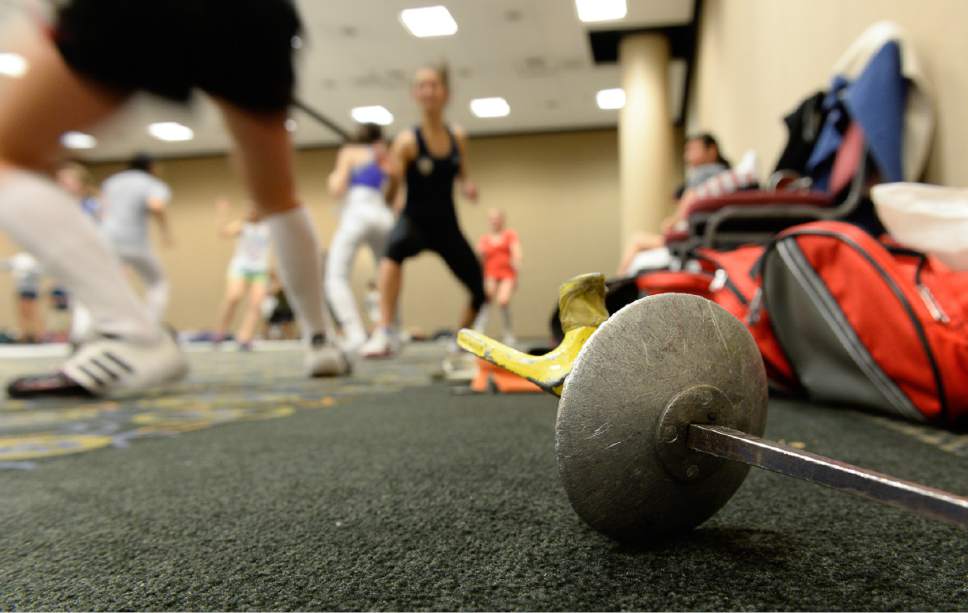Francisco Kjolseth  |  The Salt Lake Tribune
Learning the way of the foil, young fencers are coached by olympians during the USA Fencing National Championships in Salt Lake City on Friday, July 7, 2017. More than 4,000 athletes from around the globe are competing.