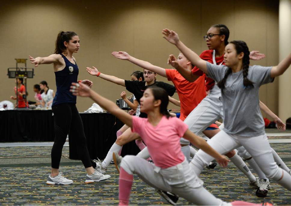 Francisco Kjolseth  |  The Salt Lake Tribune
Olympic fencer Nicole Ross runs a clinic with young girls during the USA Fencing National Championships in Salt Lake City on Friday, July 7, 2017. More than 4,000 athletes from around the globe are competing.