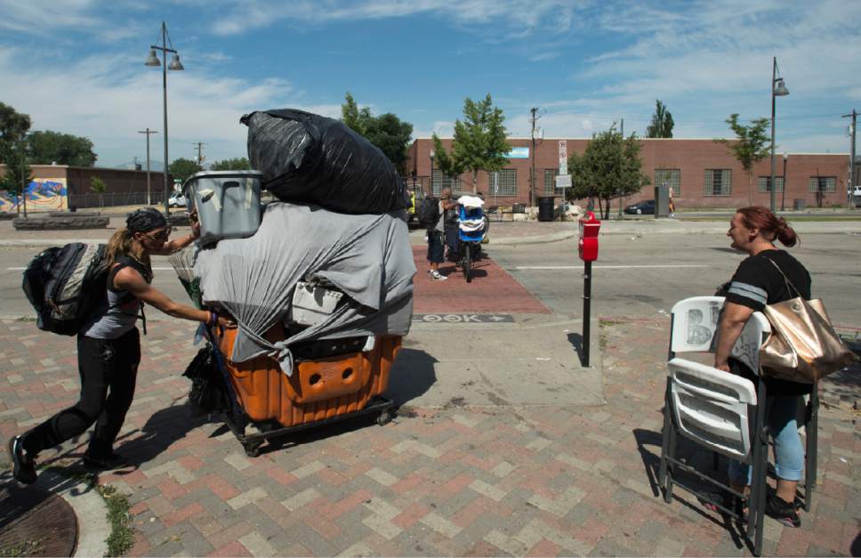 Rick Egan  |  The Salt Lake Tribune

Homeless campers are forced to remove their belonging from the Rio Grande area of Salt Lake City, as the Salt Lake County Health Department brings in heavy machinery to clean up the area on Thursday, July 6, 2017. The biggest challenge for crews is the disposal of syringes discarded by drug users.