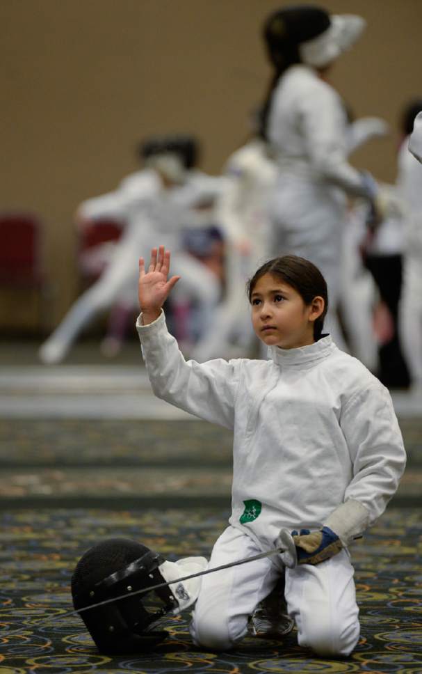 Francisco Kjolseth  |  The Salt Lake Tribune
Abigail Nager, 9 of Katonah, NY, volunteers for a demonstration with Olympian Nicole Ross during a clinic  as part of the USA Fencing National Championships in Salt Lake City on Friday, July 7, 2017. More than 4,000 athletes from around the globe are competing.