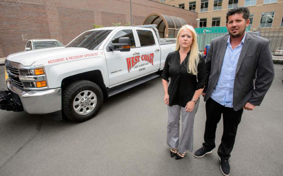 Steve Griffin  |  The Salt Lake Tribune


Heather Leyva and Robert Face of West Coast Towing, with one of their towing vehicles after the talked about a suit that their attorney Robert Sykes is filing for them against UHP and UDOT alleging favoritism in how it calls for heavy tow trucks. They outlined the case during a press conference at his law offices in Salt Lake City Monday July 10, 2017.