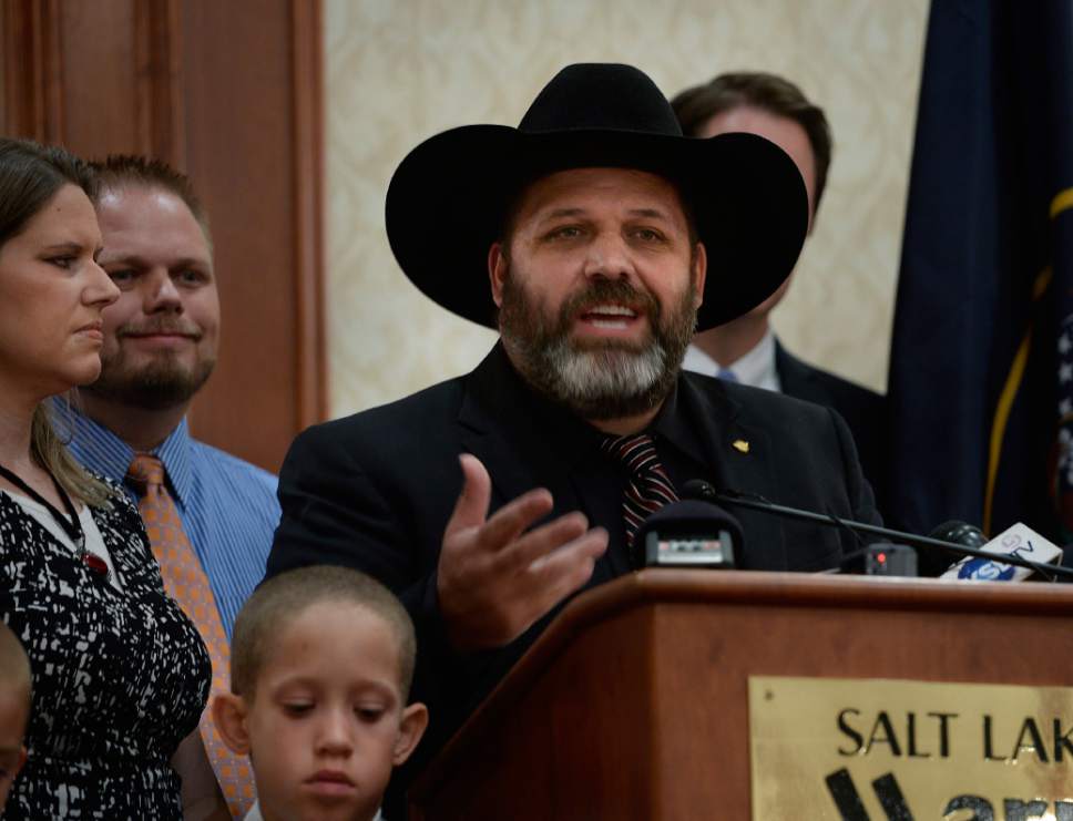 Scott Sommerdorf   |  The Salt Lake Tribune
Rick Koerber, his family and attorney Marcus Mumford, held a news conference the day after a federal judge tossed out 18 charges against Koerber that had alleged he operated a giant Ponzi scheme through his real estate company, Friday, August 15, 2014.