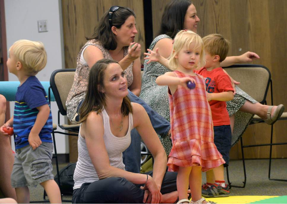 Al Hartmann  |  The Salt Lake Tribune


Heather May and her daughter, Margot, take in preschool storytime at the Holladay Library Thursday, June 22, 2017.