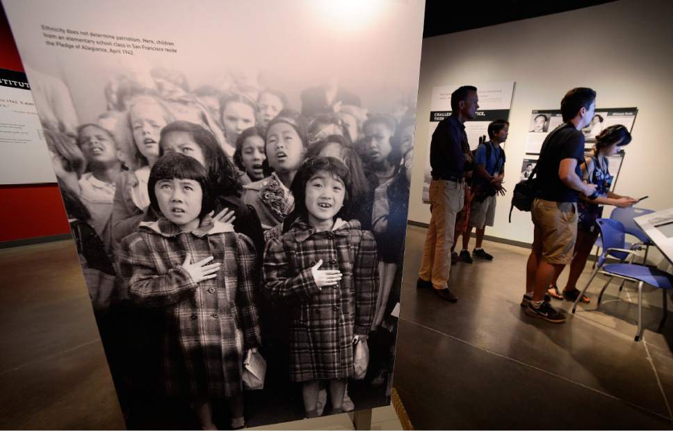 Scott Sommerdorf   |  The Salt Lake Tribune  
Visitors to the grand opening of the Topaz Museum in Delta, look at interactive features in the museum, Saturday, July 8, 2017.