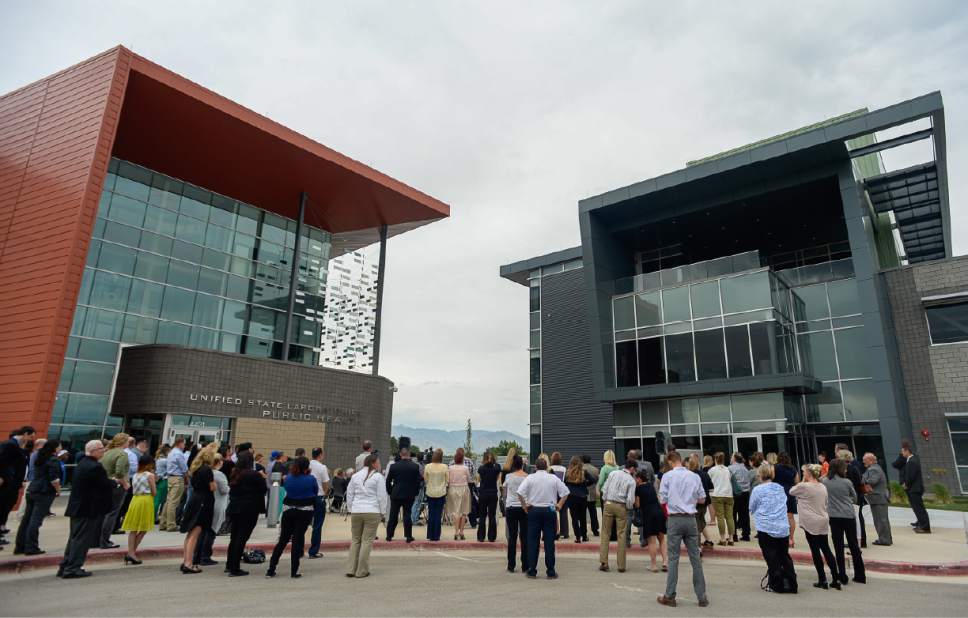 Francisco Kjolseth | The Salt Lake Tribune
The Department of Public Safety celebrates the opening of the new State Crime Lab in Taylorsville on Thursday, June 1, 2017. Housing the Utah State Medical Examiner's Office and the Department of Agriculture the new building features a ballistics firing range, vehicle processing bays, trace evidence labs, chemistry labs and a robotic DNA testing lab.