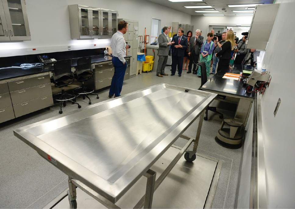 Francisco Kjolseth | The Salt Lake Tribune
Representatives tour the body receiving room of the new State Crime Lab in Taylorsville on Thursday, June 1, 2017. Housing the Utah State Medical Examiner's Office and the Department of Agriculture the new building features a ballistics firing range, vehicle processing bays, trace evidence labs, chemistry labs and a robotic DNA testing lab.