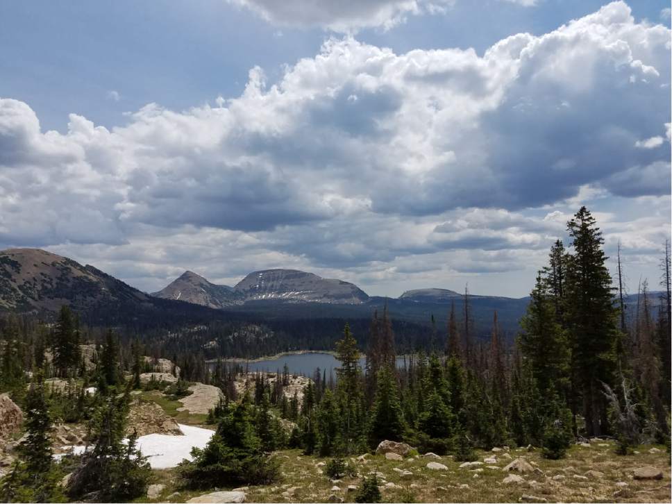 Jessica Miller  |  The Salt Lake Tribune


A lake is spotted in the distance during a hike to Clyde Lake in the Uinta Mountains.