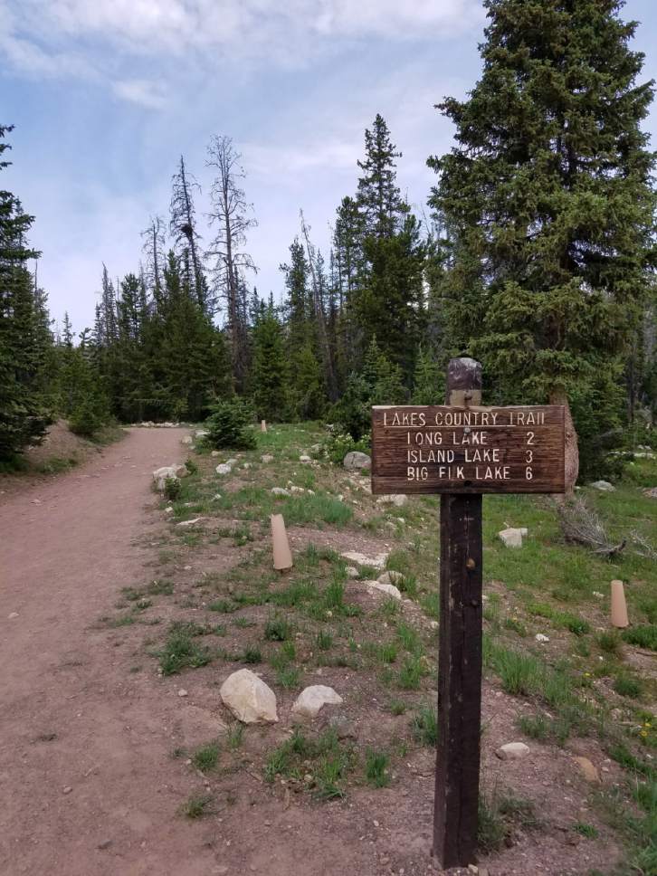Jessica Miller  |  The Salt Lake Tribune

This sign marks the trailhead to Clyde Lake in the Uinta Mountains.