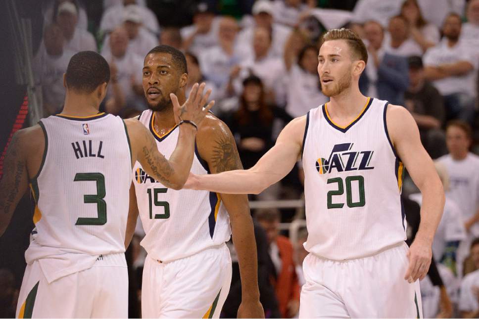 Leah Hogsten  |  The Salt Lake Tribune 
Utah Jazz guard George Hill (3), Utah Jazz forward Derrick Favors (15) and Utah Jazz forward Gordon Hayward (20) celebrate play in the first half. The Utah Jazz lead the Los Angeles Clippers after the first quarter during Game 3 of their first-round Western Conference playoff series at Vivint Smart Home Arena, Friday, April 21, 2017.