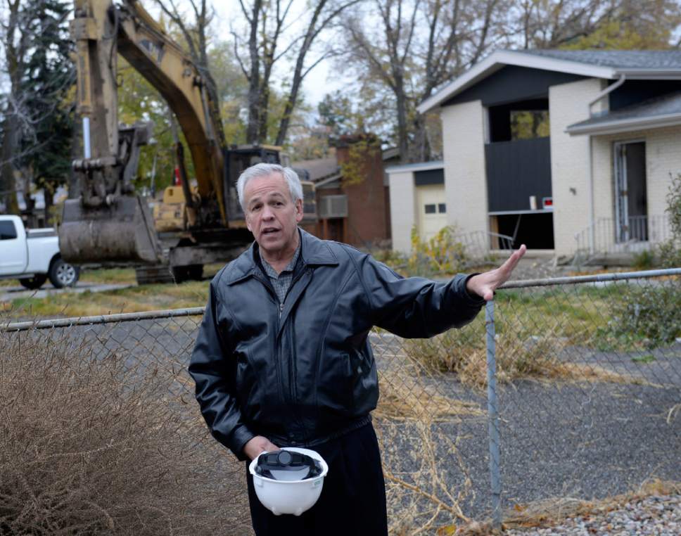 Al Hartmann  |  The Salt Lake Tribune
Cottonwood Heights Mayor Kelvyn Cullimore welcomes residents and city officials to begin the demolition of eight homes Monday, Nov. 3, 2014, that will make way for a new city hall at 7550 S. 2300 East.