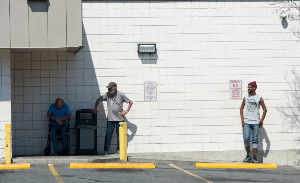 Rick Egan  |  The Salt Lake Tribune
A line forms outside the door of the state liquor store on 200 West and 400 South before it opens at 11 am, Thursday, July 6, 2017.