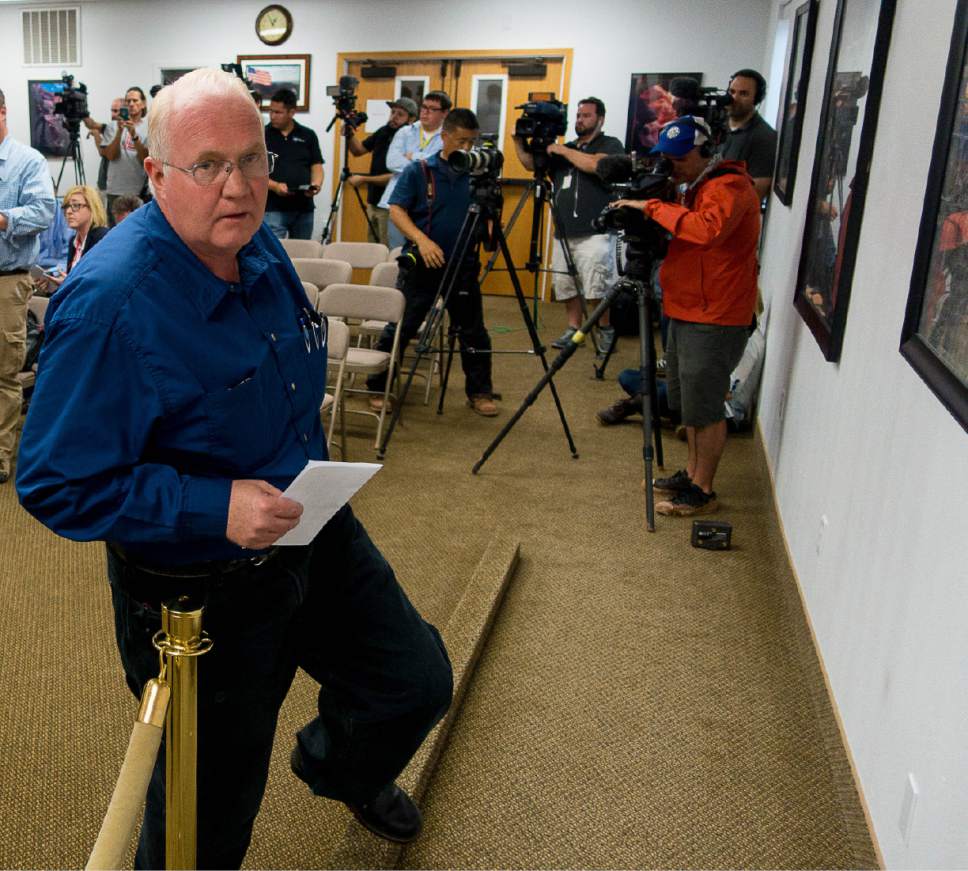 Trent Nelson  |  The Salt Lake Tribune

Hildale Mayor Philip Barlow leaves a press conference on September 15, 2015, after nine people were killed and five remained missing the day after an SUV and a van were washed off a road during a flash flood in this polygamous Utah-Arizona border community.