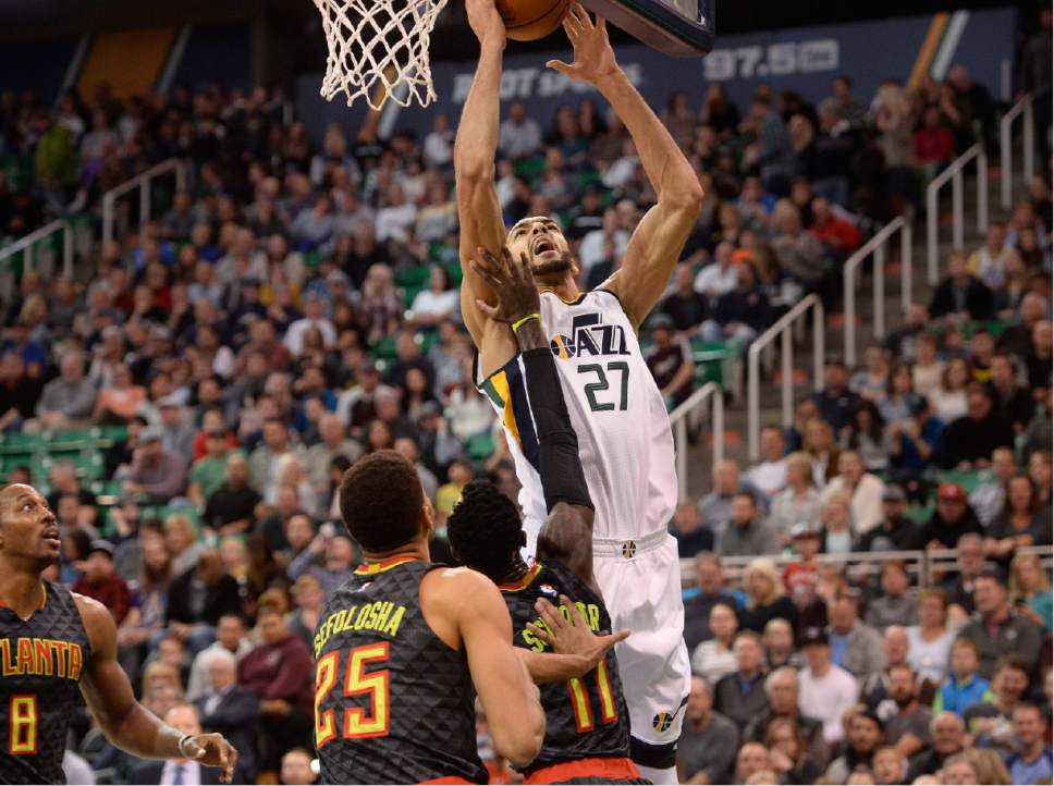 Scott Sommerdorf   |  The Salt Lake Tribune  
Utah Jazz center Rudy Gobert (27) puts back a rebound for two of the Jazz points as the Jazz held a 40-30 lead over the Atlanta Hawks during first half play, Friday November 25, 2016.
